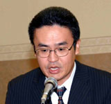 開会の言葉を述べる大山・大会実行委員