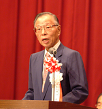 挨拶する池田･連合会会長