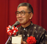歓迎の挨拶をされる嘉数・沖縄県副知事