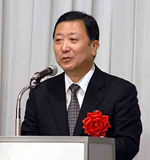 来賓挨拶をする佐々木・国税庁次長